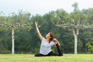 https://bloggbuzz.com/wp-content/uploads/2023/10/young-beautiful-woman-doing-yoga-exercise-outdoors.jpg