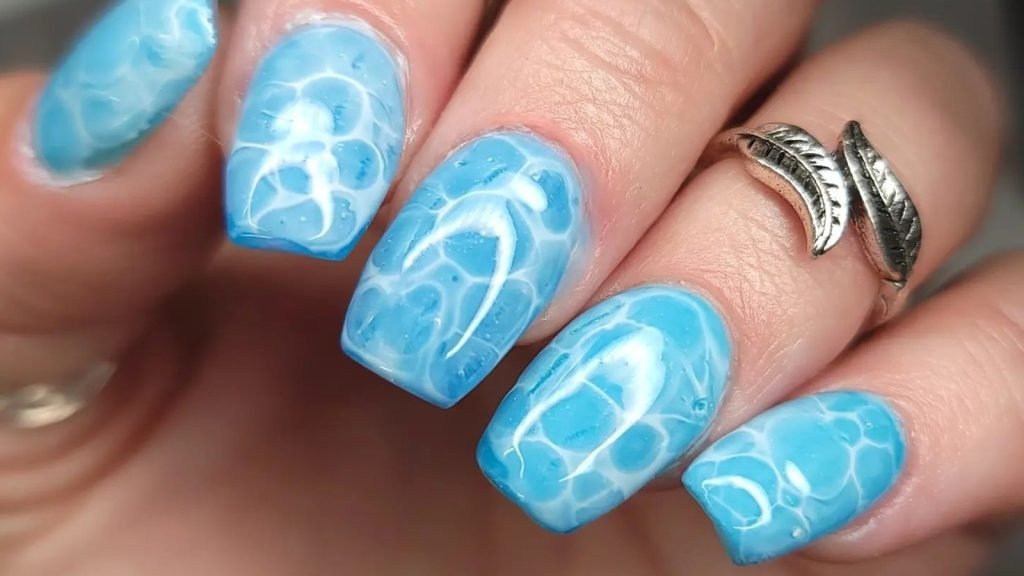 The Ultimate Guide to Women's Nail Art and Safety 4 Water Marbling